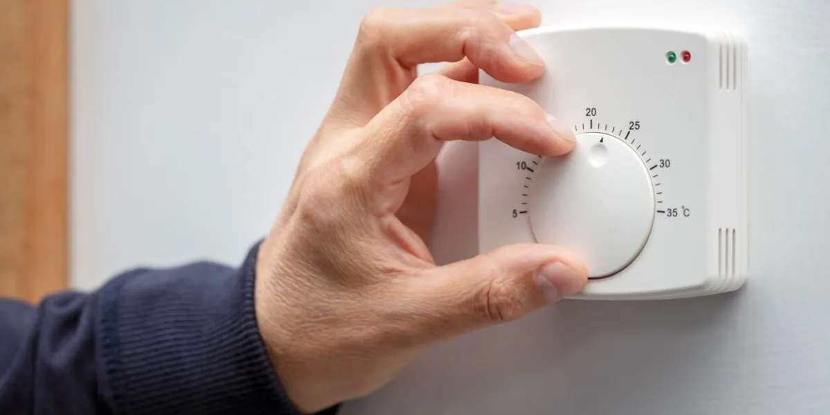 central heating thermostat control dial adjustment