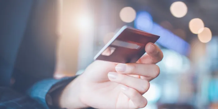 business woman hand holding a credit card