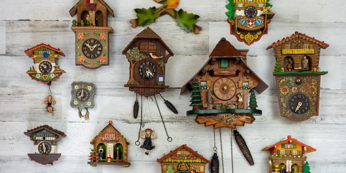 collection of vintage handpainted wooden cuckoo clocks