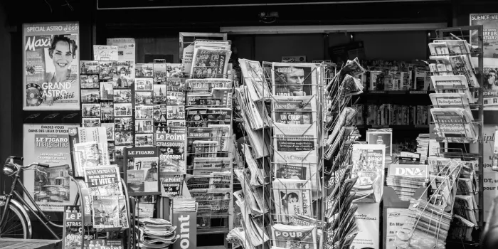paris  french press kiosk with international and french newspapers with reactions to french legislative election, 2017 a day after first round