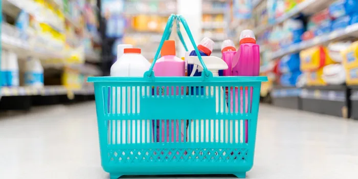 supermarkets, markets or grocery stores with good quality baskets cleaning equipment retail purchases in the shopping cart a group of utensils or cleaning products on the floor