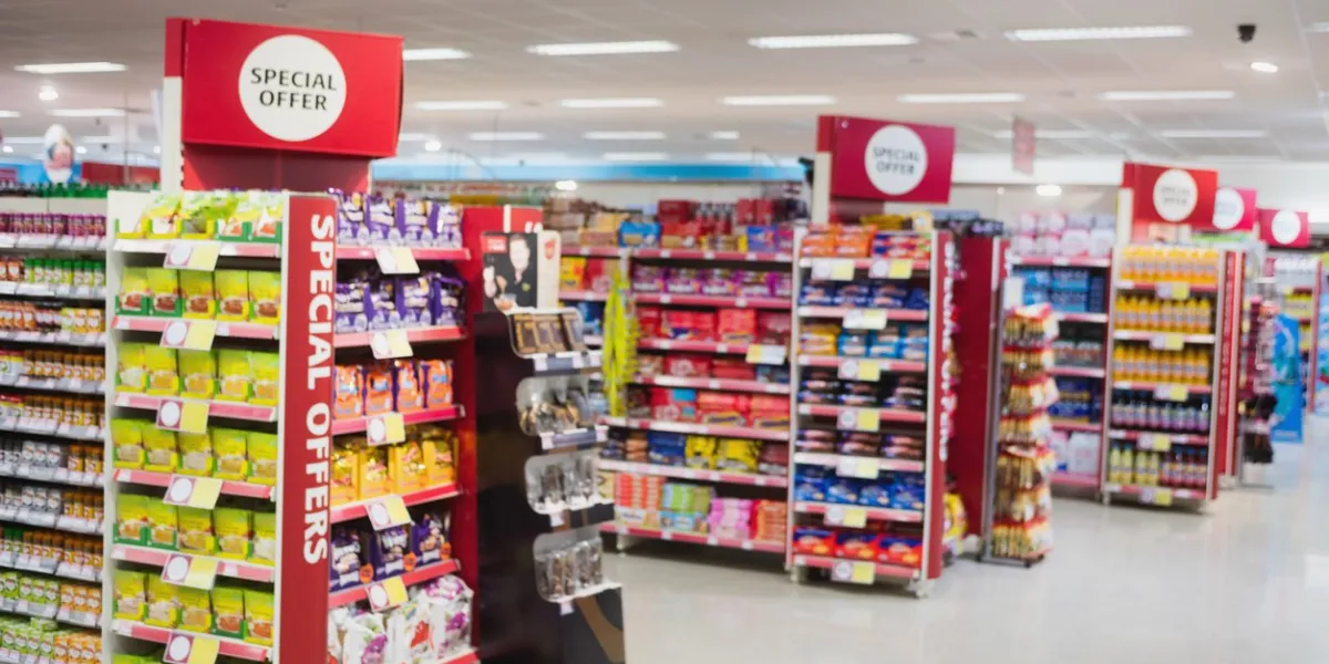 photograph of shelves with promotions in a supermarket