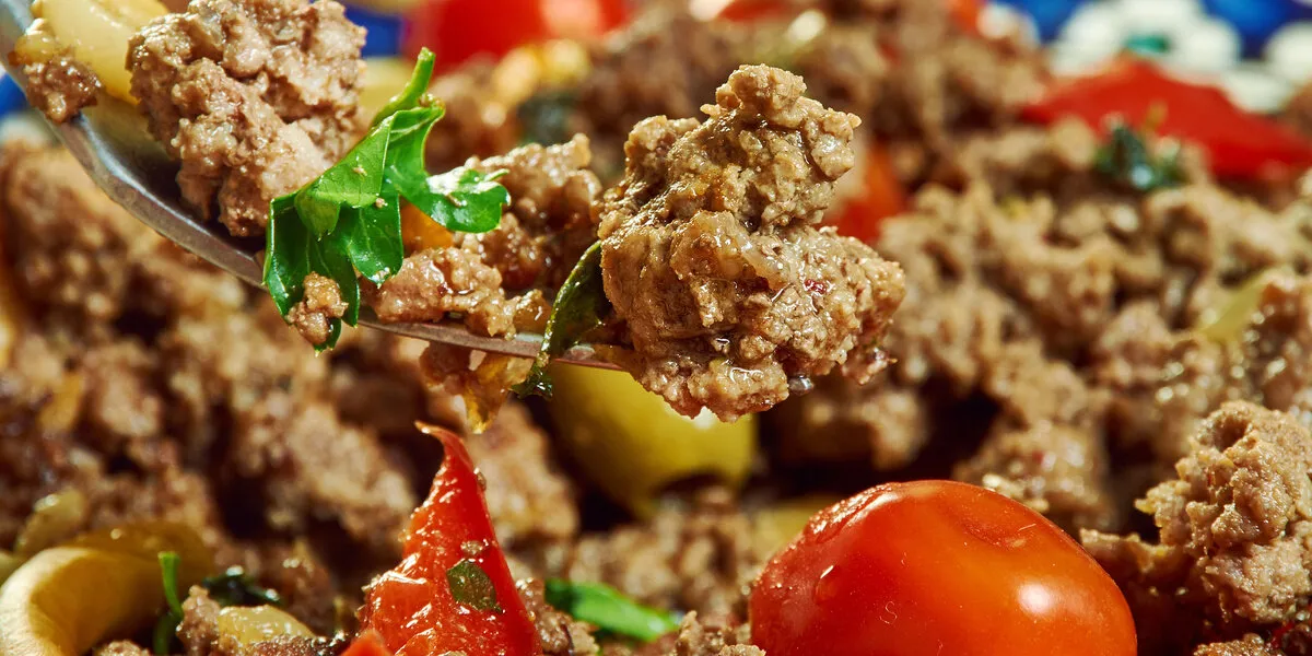 veal axoa typical basque dish prepared with mashed veal, onions, tomatoes sauté and flavoured with red espelette pepper