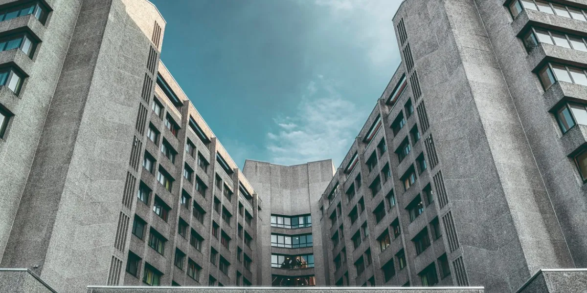 symmetric concrete skyscraper, toned image