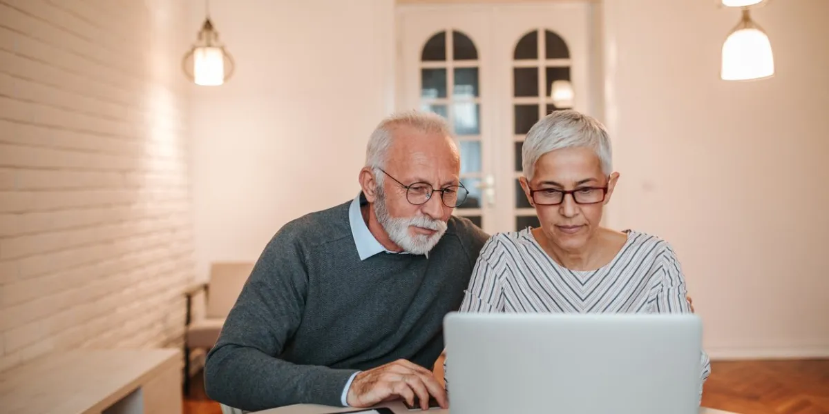 senior couple browsing the internet together
