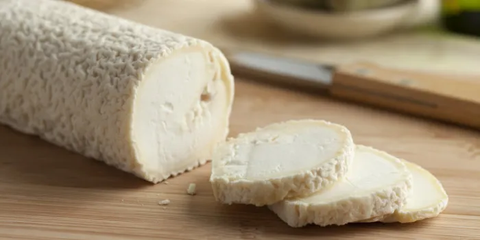 fresh caprifeuille cheese and a slice