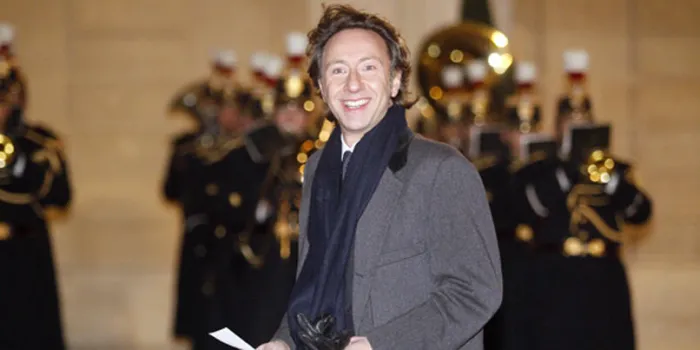 l'hôte de télévision français stéphane bern sourit alors qu'il arrive pour un dîner d'État avec le roi et la reine de suède au palais présidentiel d'elysée à paris le 2 décembre 2014 afp photo matthieu alexandre afp photo matthieu alexandre