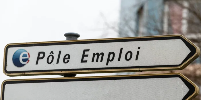 calais, france - january 13,2020   pole emploi logo on signboard pole emploi is a french governmental agency which registers unemployed people