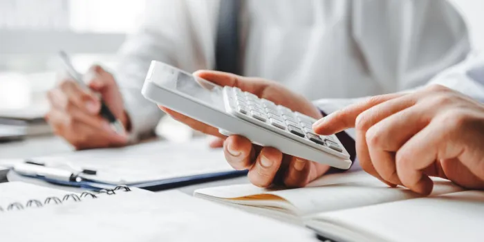 co-working business team accounting investment and saving cost discussing new plan financial graph data