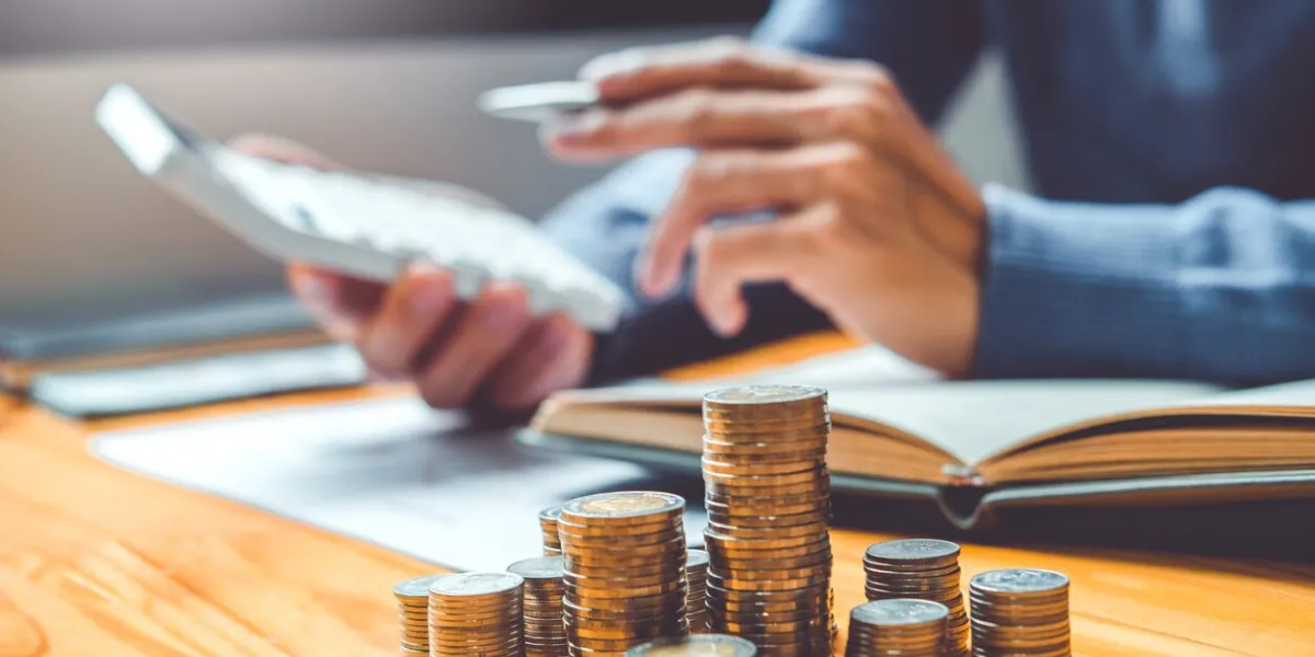 saving money concept man hand putting row and coin write finance saving money concept man hand putting row and coin write finance